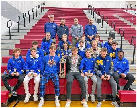 St. Marys wrestling team captures first place at Lima Senior tournament.